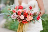 a lovely wedding bouquet with roses and carnations