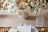 a classy modern wedding centerpiece of blush and white carnations and nothing else is a cool and stylish idea for a wedding