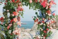 a lush summer wedding arch