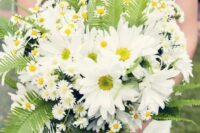 a cool and fun wedding bouquet of chamomiles, white gerberas and fern is a lovely idea for a woodland-inspired wedding