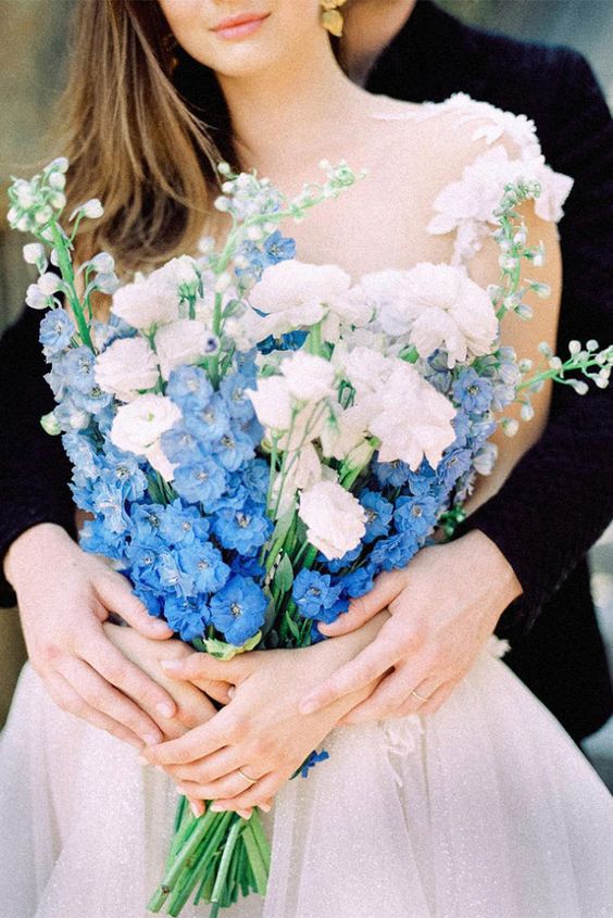 a fantastic long-stem wedding bouquet of white and blue flowers is a lovely idea for a spring or summer wedding