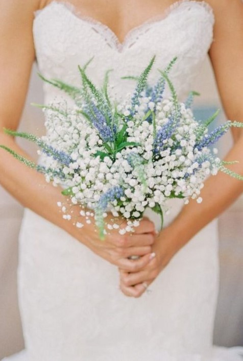 a textural baby's breath and blue Delphinium wedding bouquet looks ethereal
