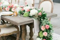 leaves, ivory hydrangeas and pink roses look lush and spring-like and make your wedding table gorgeous