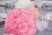pink and white carnation sphere wedding centerpieces are great to add interest to the table