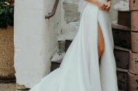 03 a beautiful modern wedding ballgown with spaghetti straps, cutout sides and a thigh high slit plus a train is a gorgeous idea for  amodern bride