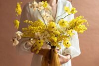05 a bright spring wedding bouquet with mimosa is a cool idea for a modern or fine art wedding is a fantastic idea