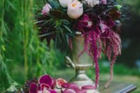09 a bold wedding centerpiec eof pink roses, blush peonies, greenery and foliage, orchids and amaranthus is amazing for the fall