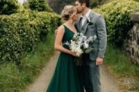 09 a simple and stylish green A-line wedding dress with thick straps, a deep neckline and a train makes a statement