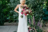 12 a minimalist wedding dress on spaghetti straps with a plunging neckline and a low back
