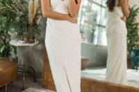 13 a modern relaxed plain slip wedding dress with a deep V-neckline plus statement earrings for an edgy look