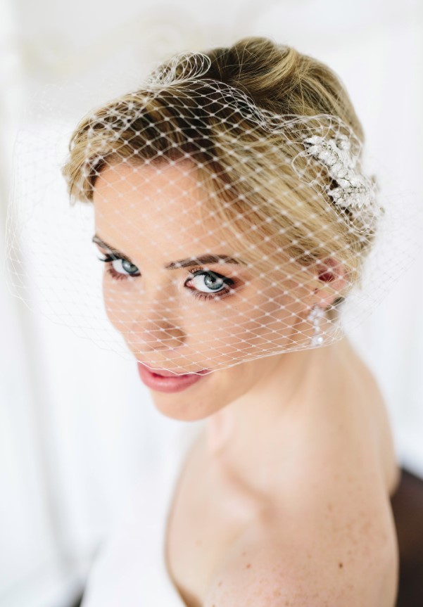 a refined vintage birdcage veil is a perfect solution for a sophisticated bridal look, and it's great on wedding updos