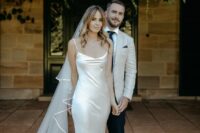 14 a silk slip maxi wedding dress paired with a long veil are a lovely idea for a modern or minimalist bride