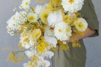16 a lush wedding bouquet of white and yellow blooms including mimosa and orchids is a lovely and bright idea