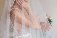 17 a gorgeous beaded veil worn with a beaded wedding gown adds a glam feel to the look