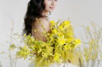 18 a pretty spring wedding bouquet in yellows, with mimosa is a catchy idea for a spring bride and a bold wedding
