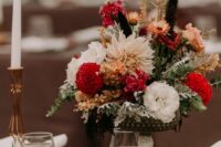 20 a chic and bold wedding centerpiece of white lisianthus, burgundy mums, hydrangeas, some dried blooms and pale miller