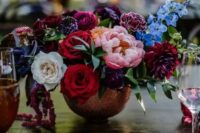 20 a chic jewel tone wedding centerpiece of deep red, blush, purple, burgundy and blue blooms and greenery is a lovely idea for the fall