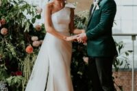 20 a modern off the shoulder mermaid wedding dress with a bow on the shoulder and a train is a chic idea for a modern glam wedding