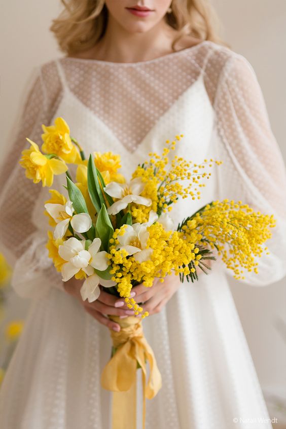 a spring wedding bouquet of mimosa, white and yellow daffodils is a cool and bright idea for spring