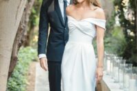 23 a modern off the shoulder wedding dress with a draped bodice and a pleated skirt with a train is a lovely idea for a modern wedding