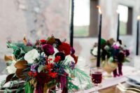 24 a chic fall wedding centerpiece of red and white roses, deep purple and fuchsia blooms, berries, greenery and amaranthus
