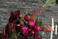 33 a chic fall wedding centerpiece of pink peonies, amaranthus, greenery, berries and foliage is amazing for the fall