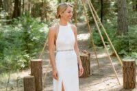 34 a minimalist halter neckline wedding dress with an embellished belt and dark green suede shoes for a woodland wedding
