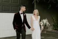 35 a modern plain wedding dress with thick straps and a depe neckline and an A-line skirt plus white shoes are a cool combo