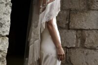 35 a super creative wedding veil with an embroidered edge and long fringe is a gorgeous idea for a boho bride