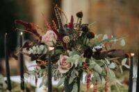 39 a refined moody secret garden wedding centerpiece of blush and dark blooms, greenery, berries and feathers is amazing for the fall