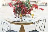 42 a super lush and bold wedding centerpiece of pink, deep red and burgundy blooms and greenery is a gorgeous idea for a Valentine wedding