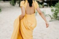 a lovely yellow wedding dress