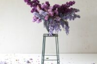 a gorgeous purple wedding centerpiece