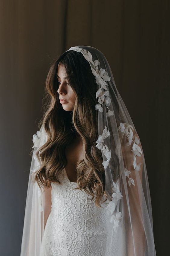 a Juliet cap veil with floral applique is a beautiful and chic idea for a bride who wants a floral accessory