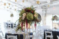 47 a tall wedding centerpiece of blush rsoes, green hydrangeas, burgundy mums and dahlias and amaranthus for the fall