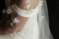 48 a refined modern wedding dress and a cathedral veil with pearls and white fabric beads are a beautiful idea for a modern refined bride