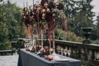48 tall fall wedding centerpieces of yellow roses, burgundy hdyrangeas, amaranthus, greenery and burgundy dahlias plus candles