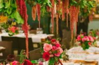 49 lush overhead floral arrangements of pink dahlias and peonies, roses and amaranthus plsu greenery are jaw-dropping