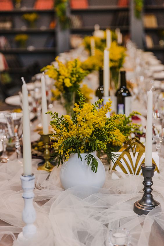 mimosa wedding centerpieces dotting the table will give it color and interest, try them out for a spring or summer wedding