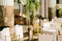 50 a refined tall wedding centerpiece of blush roses and hydrangeas, twigs, greenery and amaranthus is chic and cool