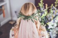 51 a boho wedding dress decorated with blooms and a blush veil attached to a greenery halo look fantastic