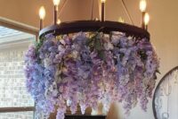 51 a wedding chandelier with wisteria and periwinkle is a cool solution for a wedding with a pastel color palette