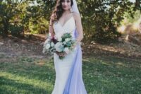 54 a modern plain mermaid wedding dress with spaghetti straps and an ombre white blue veil for a bold look