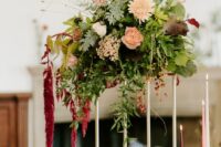 57 a tall wedding centerpiece of blush dahlias and roses, greenery and grasses and amaranthus is a lovely idea for the fall