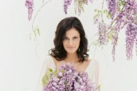 59 a cascading wedding bouquet of wisteria and greenery is a lovely idea for a spring wedding