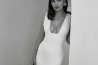 60 a modern plain fitting wedding dress with a deep and sexy neckline and thick straps is a lovely idea for a modern wedding