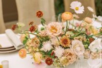 72 a refined muted color fall wedding centerpiece of white, blush, yellow and burgundy blooms and greenery is a lovely and delicate idea