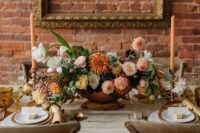 74 a sophisticated fall wedding centerpiece of blush mums, rust dahlias, white and yellow blooms and greenery is adorable