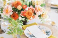 79 a vibrant fall wedding centerpiece of pink peonies, orange mums and other smaller fillers and greenery is a gorgeous idea