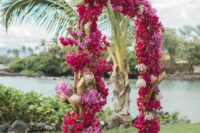 a lovely tropical wedding arch